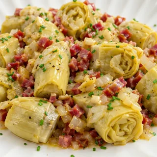 Alcachofas con Jamón: Cena Gourmet Rápida - alcachofas jamón - Alcachofas jamón: Prepara esta receta saludable y rápida con alcachofas en conserva y jamón. Idea